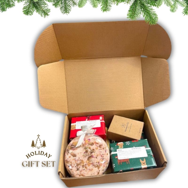 Christmas Gift Set featuring handmade bath salt, mini soap set, and five luxury soap bars in festive packaging.