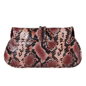 Frances Python Clutch by Havana & Co. crafted from Italian leather with python print and buffalo horn ring closure