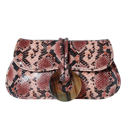 Frances Python Clutch by Havana & Co. crafted from Italian leather with python print and buffalo horn ring closure