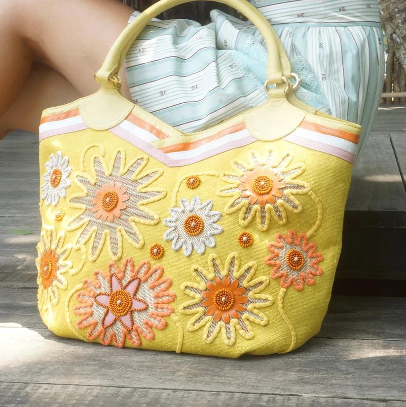 Odorata Embroidered Beach Bucket Bag by Havana & Co. – Handcrafted coastal bag with embroidery, leather handles, and spacious design for beach outings.